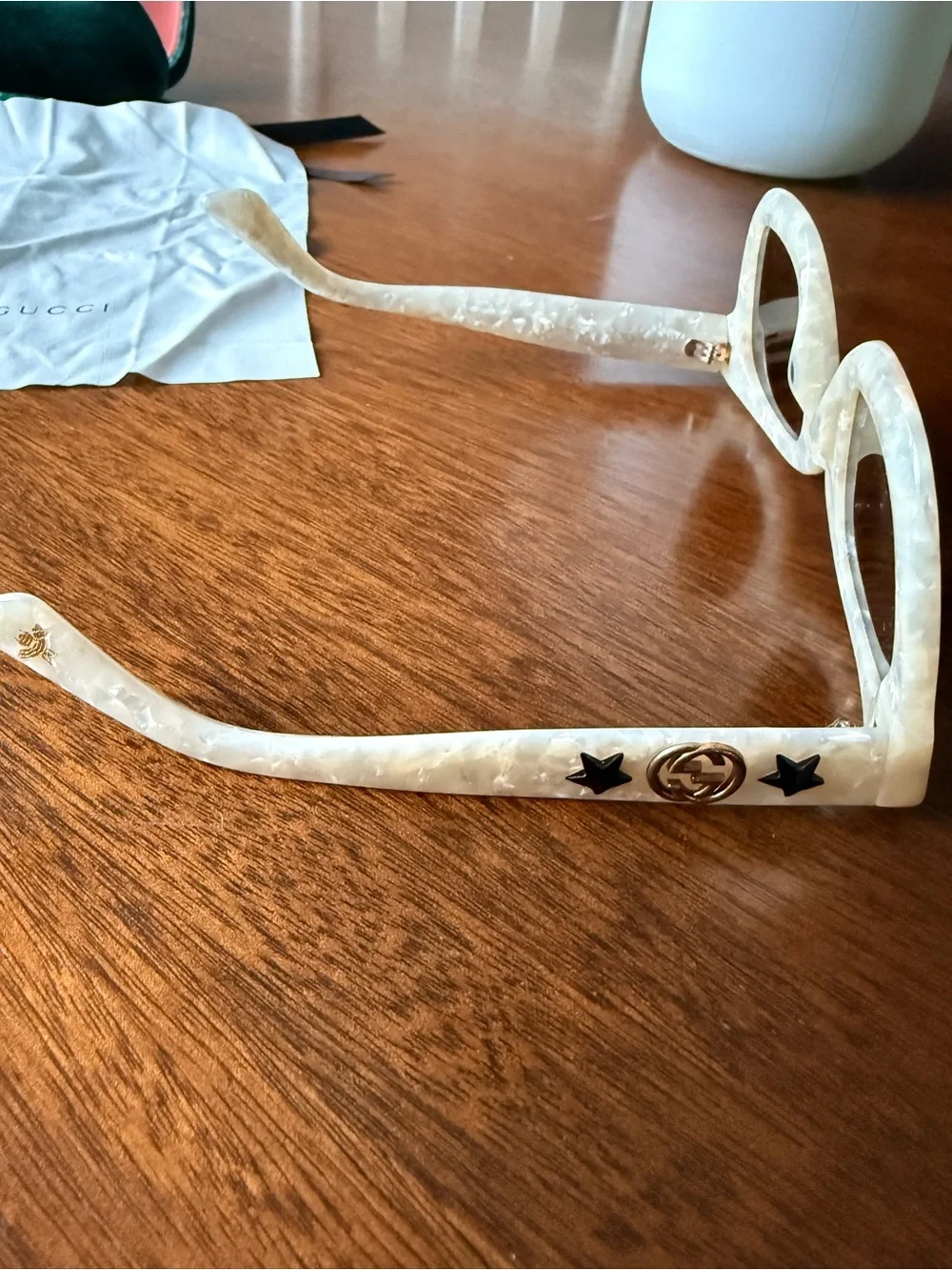 Gucci Ivory Marbled Oversized Sunglasses with Gold Logo and Black Star Accents